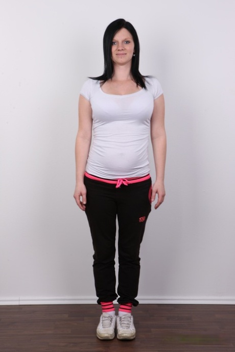 Dark haired girl Jarka gets totally naked on a stool while pregnant