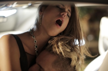 Erotic model Caprice sucks cock and fucks her date cowgirl style in the car