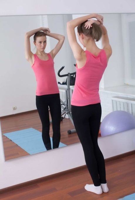 Tall teen Daniela gets banged by her personal trainer on yoga mat
