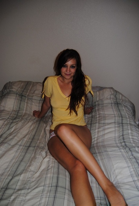 Ex-girlfriend exposes her natural breasts while laying on bed in cute panties
