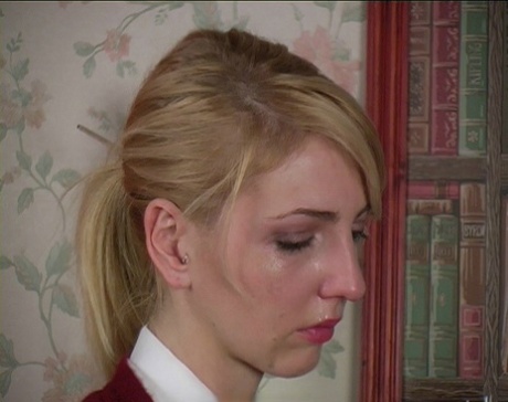 Blonde student has her ass turned bright red by her schoolteacher