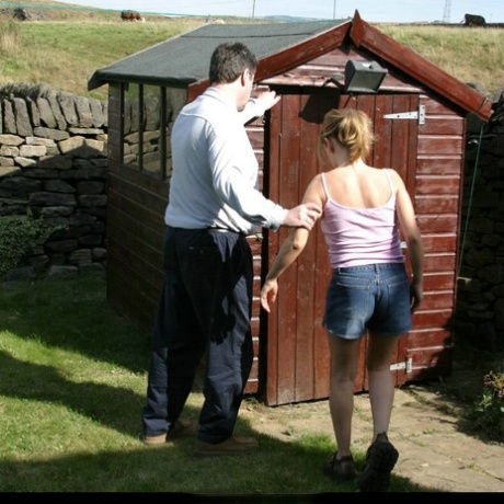 Caucasian girl is taken into a shed for a much-needed spanking