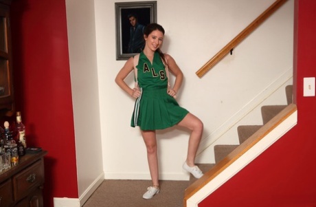 College cheerleader Charly Summer toys her vagina after getting naked