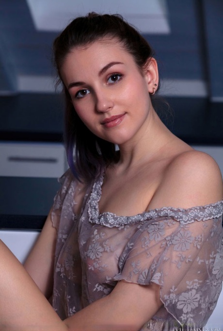 Young brunette Isabele sets her great body free of sheer clothing