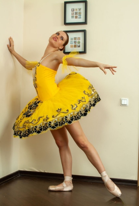 Pretty ballerina Metis P hits upon great poses while stripping to her slippers