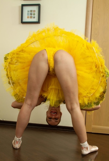 Pretty ballerina Metis P hits upon great poses while stripping to her slippers