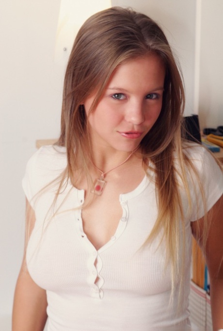 Sweet teen Dawson Miller uncovers her firm tits while getting butt naked