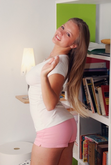 Sweet teen Dawson Miller uncovers her firm tits while getting butt naked