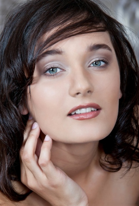 Brunette teen Chandra does away with a cocktail dress to pose in the nude