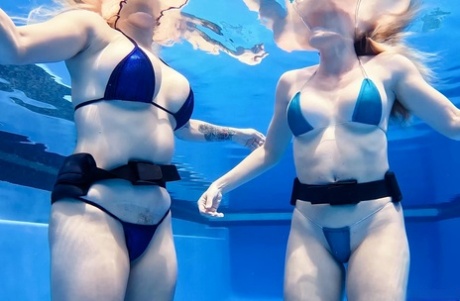 Cory Chase and Lory Lace have underwater lesbian sex in a public pool