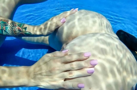 Cory Chase and Lory Lace have underwater lesbian sex in a public pool