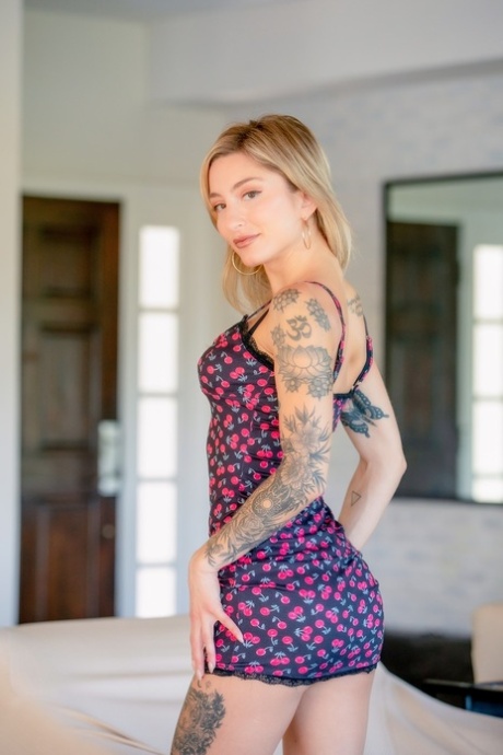 Tattooed blonde Kathryn Mae gets jizz on her big tits during a fuck