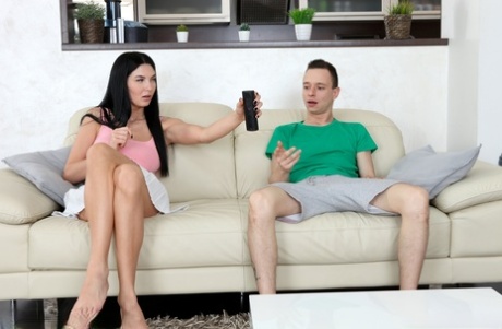 Dark haired girl Simon Kitty has sex on a sofa with her stepbrother