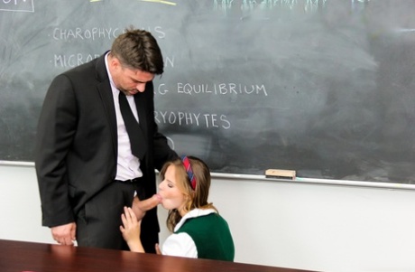 Schoolgirl Jillian Janson gives teacher Tony Ribas blowjob in the classroom