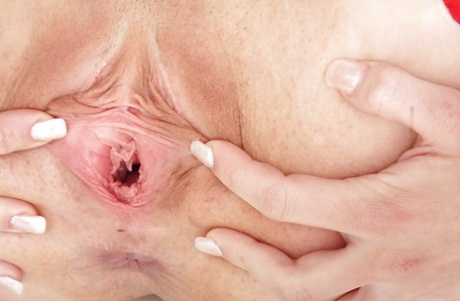 Lusty gyno nurse in red stockings spreading her pink hole in close up
