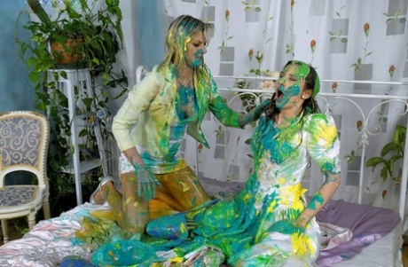 European fetish babe Kitty Saliery has some messy fun with her female friend