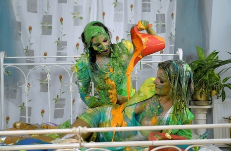 European fetish babe Kitty Saliery has some messy fun with her female friend