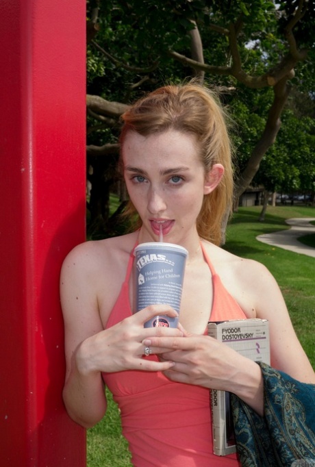 Slutty teen in a skimpy red dress Phoebe Keller giving an upskirt in public