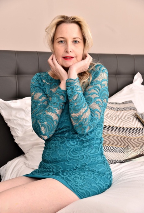 Older British housewife Emma Turner plays with herself after getting naked