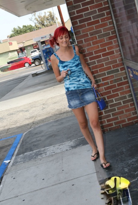 Redhead Phoenix Askani gets analized through gloryhole in the public bathroom