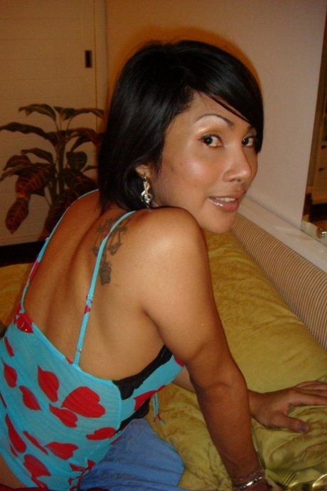 Amateur ladyboy Golf showing big fake tits under sexy lingerie & medium cock