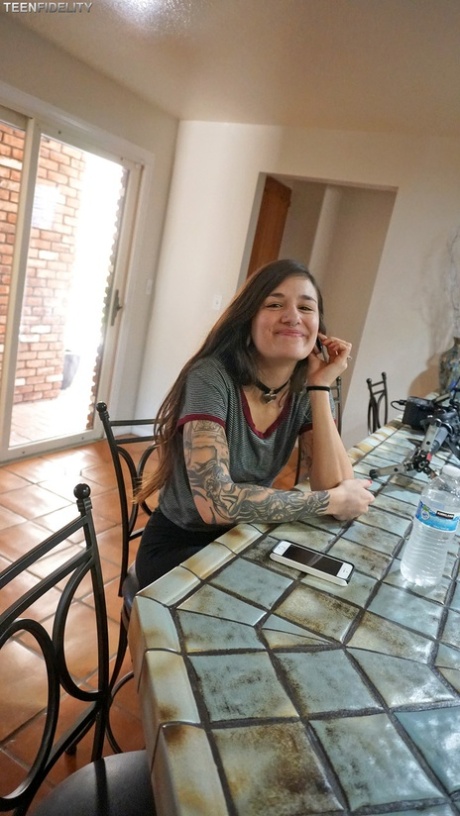 Goth brunette Luna Lovely strips her clothes and shows her sexy tattoos