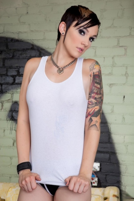 Cute Nikki showing every inch of her petite frame and pierced natural tits