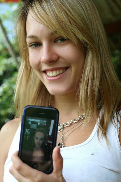 Blonde Hungarian girl with natural tits Blue Angel showing her body