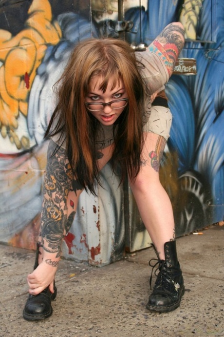 Chubby all natural Adahlia in daring outdoor strip showing off tattooed ass