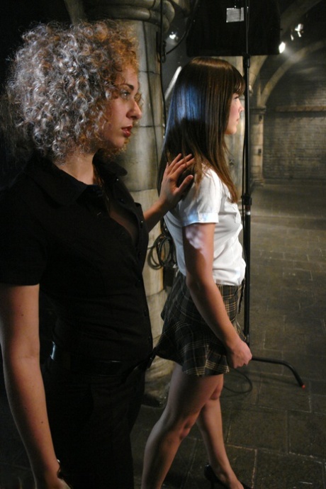 Schoolgirl Bobbi Starr bends over & gets a fingering in a hot BDSM session