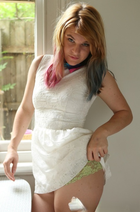 Blondie Ophelia Rose takes off her clothes, shows her puffy nipples and ass