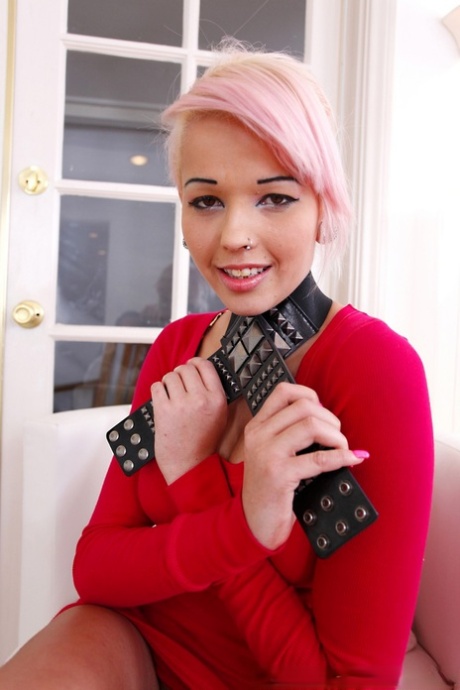 Pink haired teen Christina squeezes her mesmerizing big tits and gives head