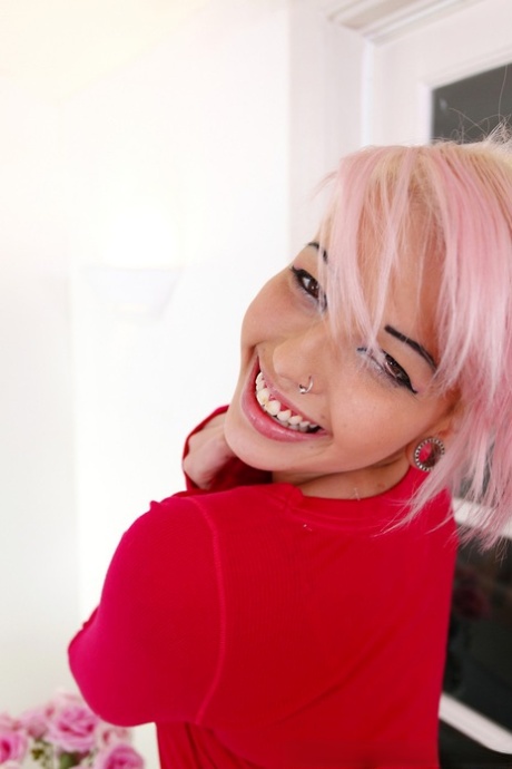 Pink haired teen Christina squeezes her mesmerizing big tits and gives head