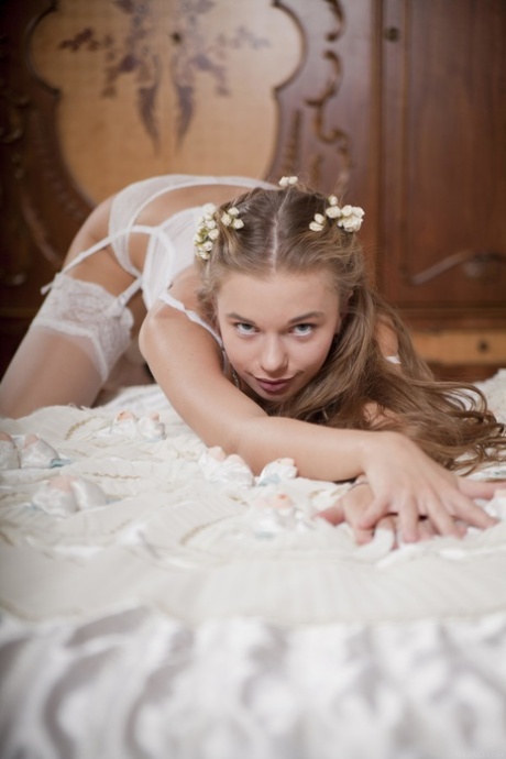 Gorgeous teen in white lingerie Milena D exposing her yummy pussy