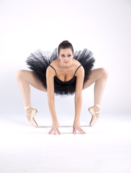Sexy teen ballerina Bianca C gets naked & shows her big tits and bald pussy