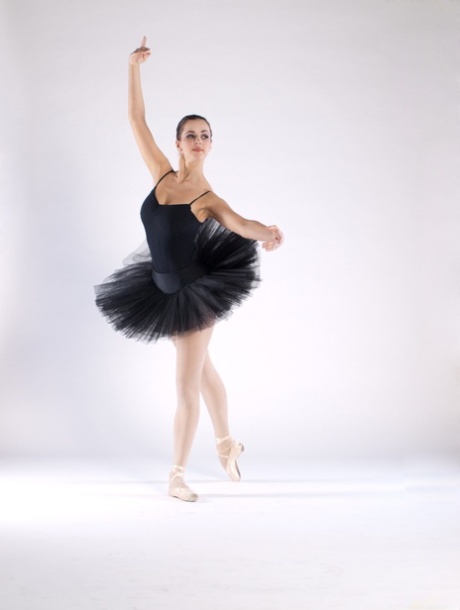 Sexy teen ballerina Bianca C gets naked & shows her big tits and bald pussy