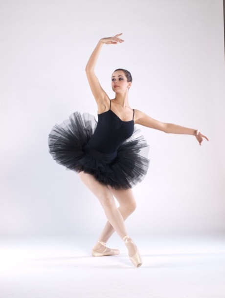 Sexy teen ballerina Bianca C gets naked & shows her big tits and bald pussy