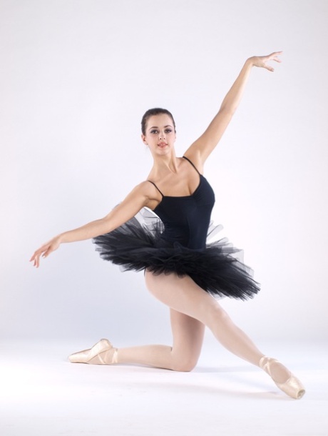 Sexy teen ballerina Bianca C gets naked & shows her big tits and bald pussy