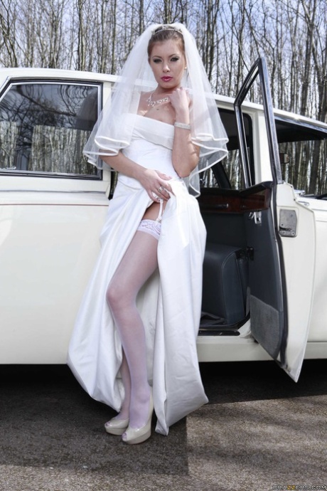 Lusty bride Donna Bell shows her juggs and hungry holes in limo