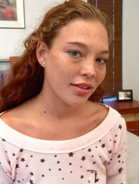 Ginger amateur teen with a freckled face Ashley strips and gives head in POV
