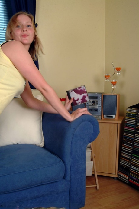 European teen with nice tits Tabbi flaunts her curves on a couch
