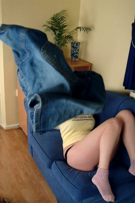 European teen with nice tits Tabbi flaunts her curves on a couch