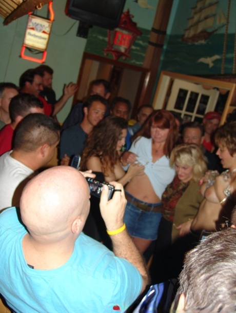 Naughty mature wife Tracy Lick shows off her big tits at a swingers party