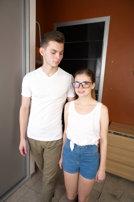 Skinny teen in glasses Bella Gray rides a big cock & takes a facial cumshot