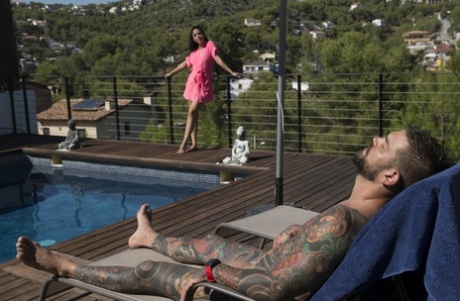 Dark haired Argentinian babe flashes her frim tits and teases a tattooed guy