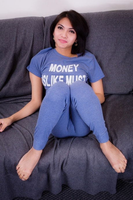 Sexy Asian shemale Sofie fingering and toying her asshole on the sofa