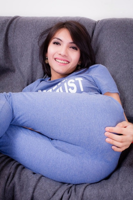 Sexy Asian shemale Sofie fingering and toying her asshole on the sofa