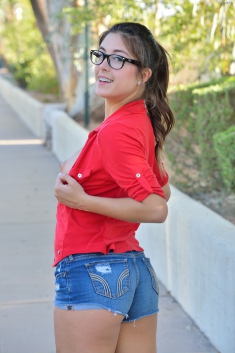 Cute babe in glasses Natalie fingering herself after getting naughty in public