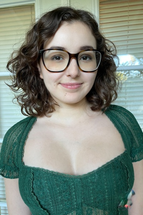 Nerdy girlfriend Leana Lovings displays her lovely tits, round ass & hot twat