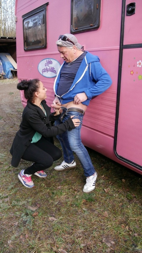 Brunette amateur Karin gives a driver a BJ before getting fucked in a trailer